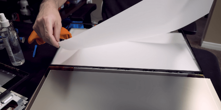 Remove the White Sheet from the TV Panel